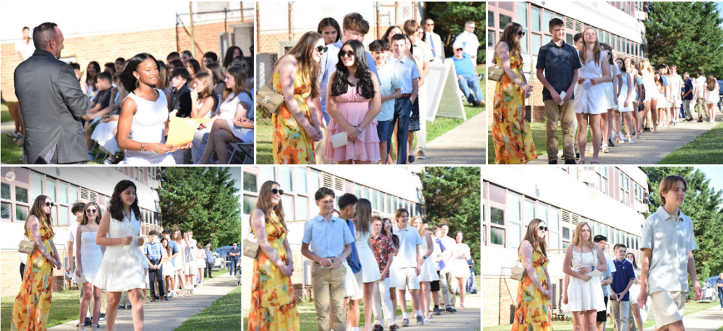 students receiving diplomas